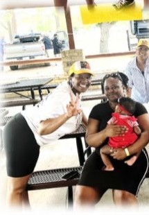 A woman holding a baby