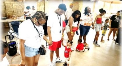 Family dancing with toddlers