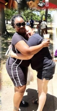 Two women hugging