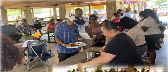 Family serving food down the line