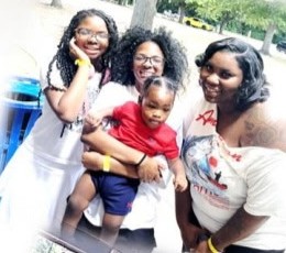 Three women with a toddler