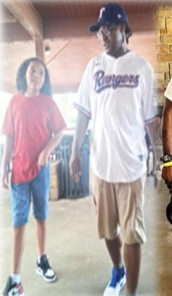 A boy and a man in a Rangers jersey
