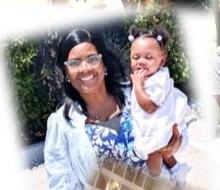 A woman holding a baby girl