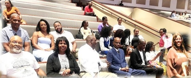 Family seated together in the church pews