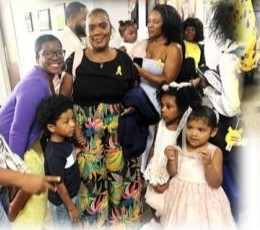 Women and children posing at church
