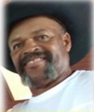 James Wheatfall smiling in a cowboy hat