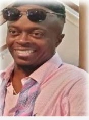 Christopher Wheatfall smiling in sunglasses