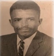 Raymond Wheatfall Sr. as a young man in a suit and tie