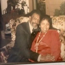 Raymond Sr. and Annie D. Wheatfall seated together, smiling